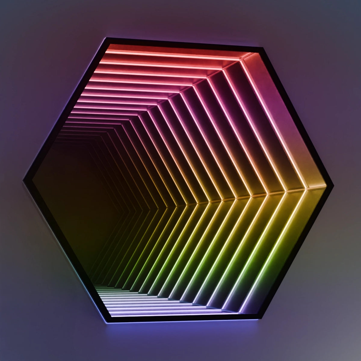 Hexagon infinity mirror glowing rainbow LED tunnel on a wall