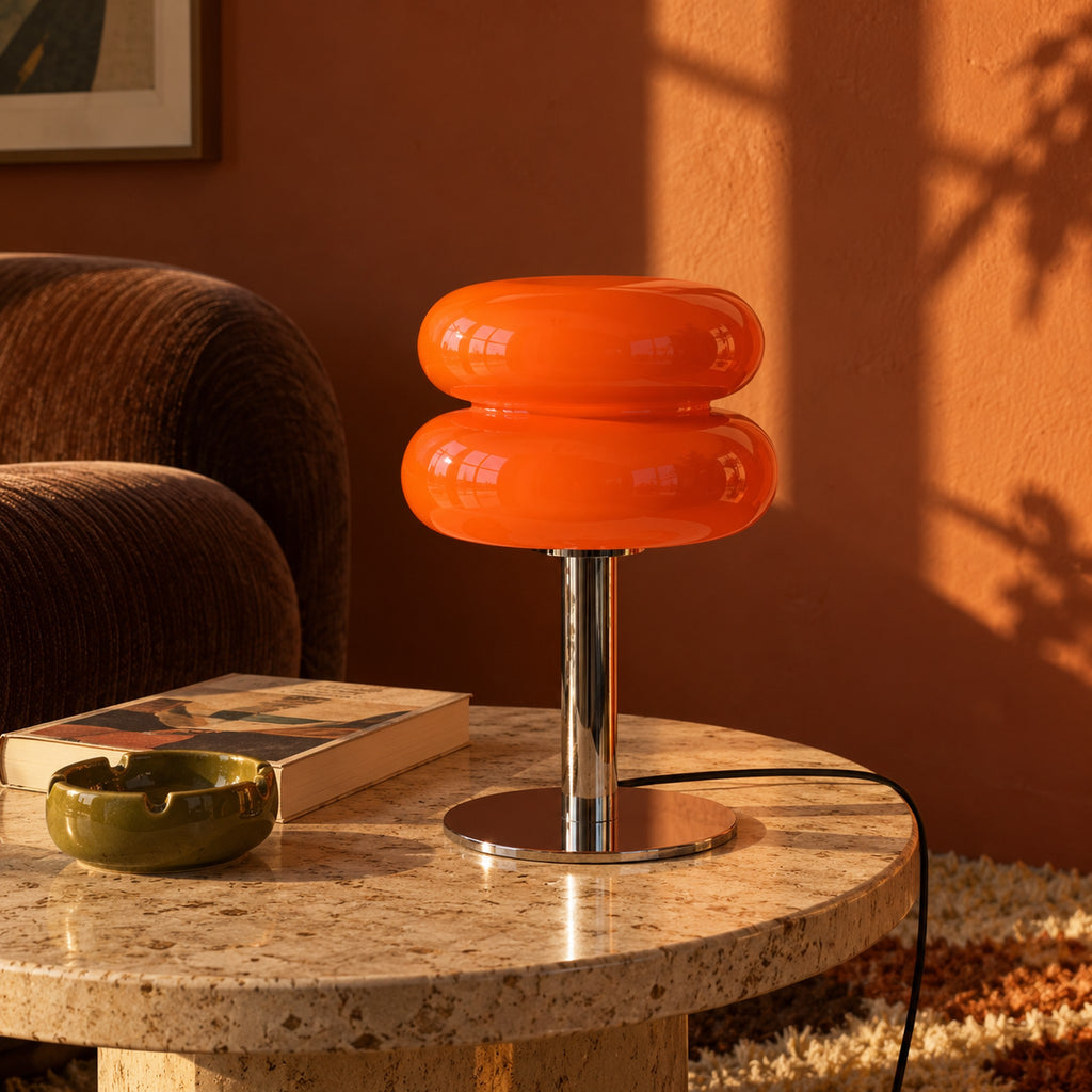 Aprica Table Lamp switched off in late sun on a terrazzo side table beside a boucle chair