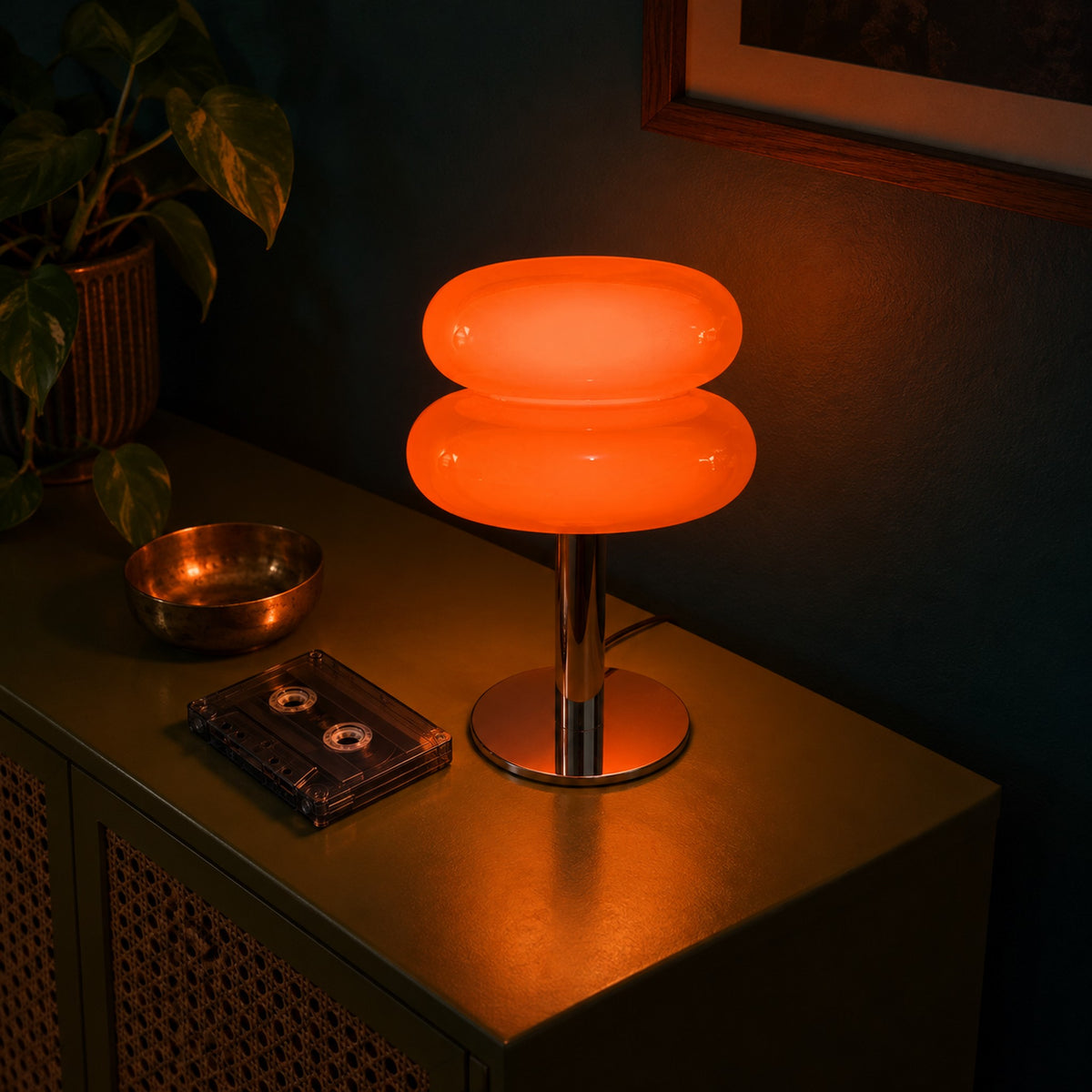 Aprica Table Lamp on a green lacquer sideboard with its plug-in power cord
