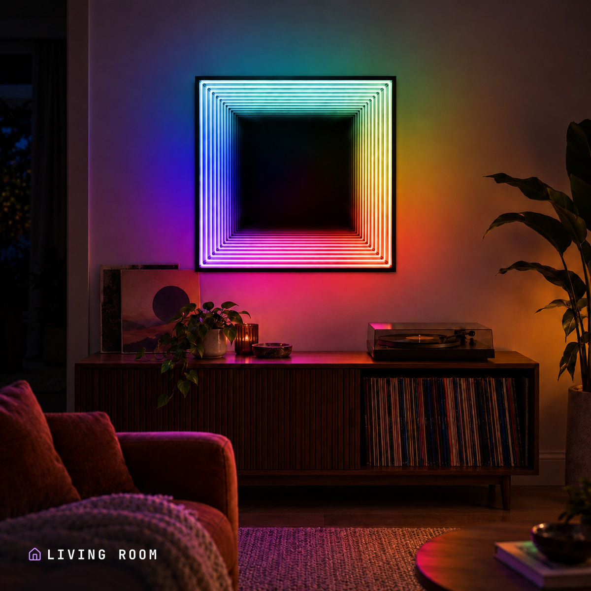 Infinity QuadraMirror lit in a living room at night, its colour spilling across the furniture
