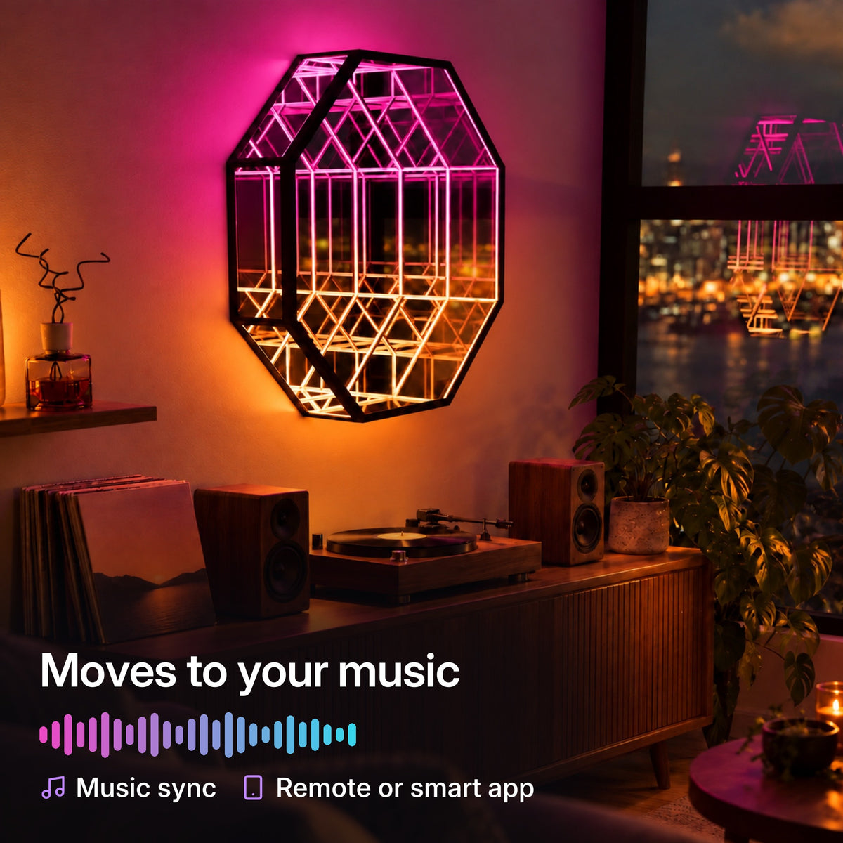OctaMirror lit pink and amber above a turntable and speakers, moving to music