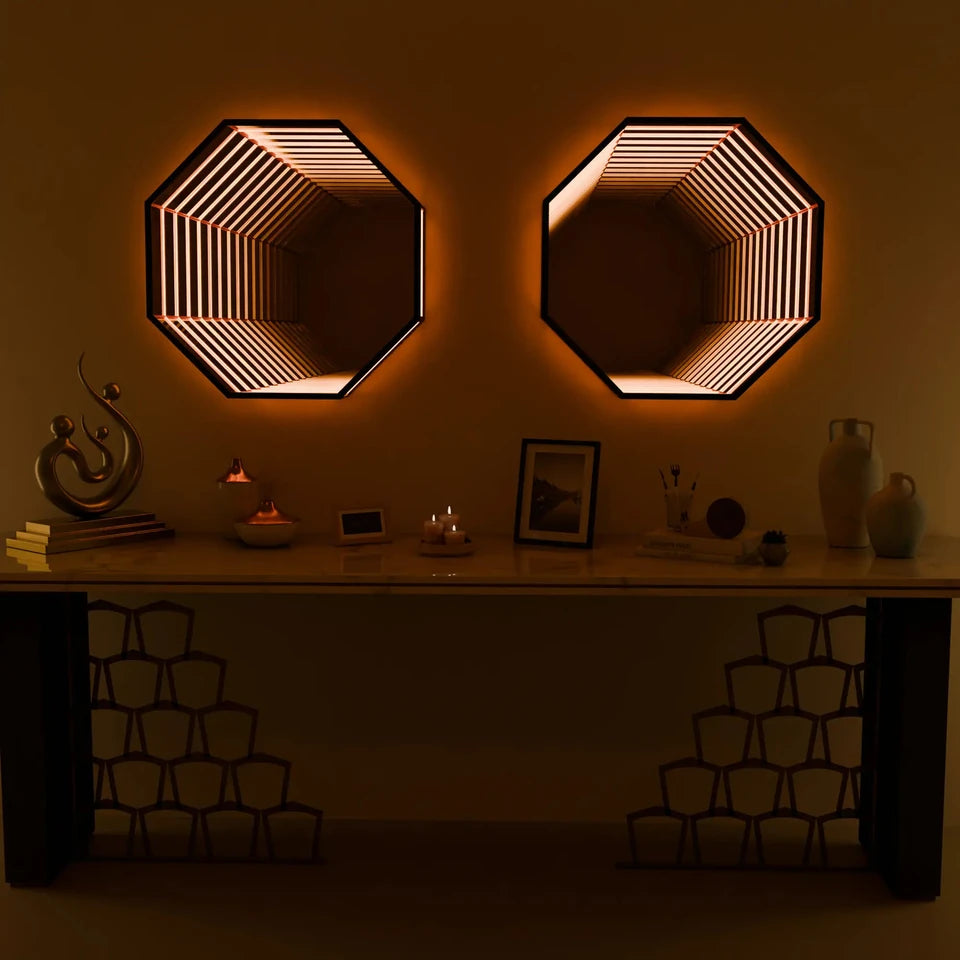 Two Infinity OctaMirrors glowing warm white above a console table